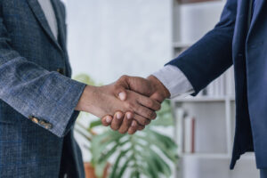 handshake between two business men